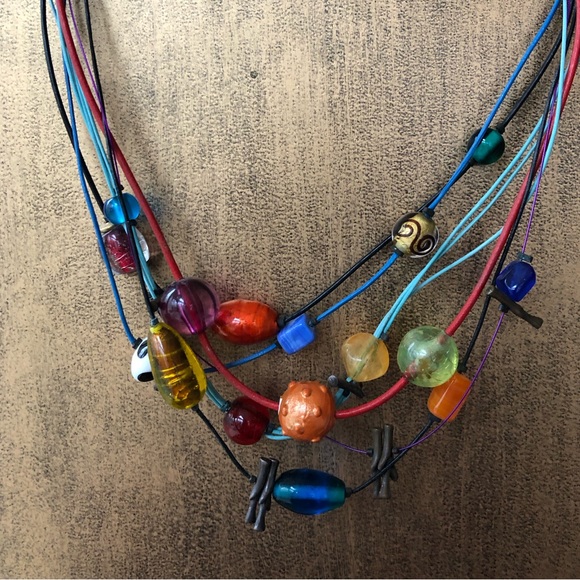 Multicolored beads and multicolored cords on this fun necklace, 17” long - Picture 9 of 9